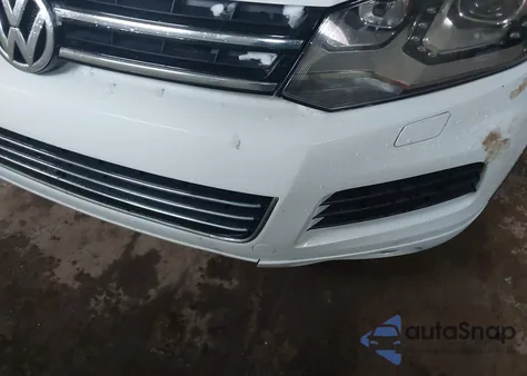 2014 Volkswagen Touareg 3.6L Executive z USA, uszkodzony, nr VIN WVGEF9BP7ED010507